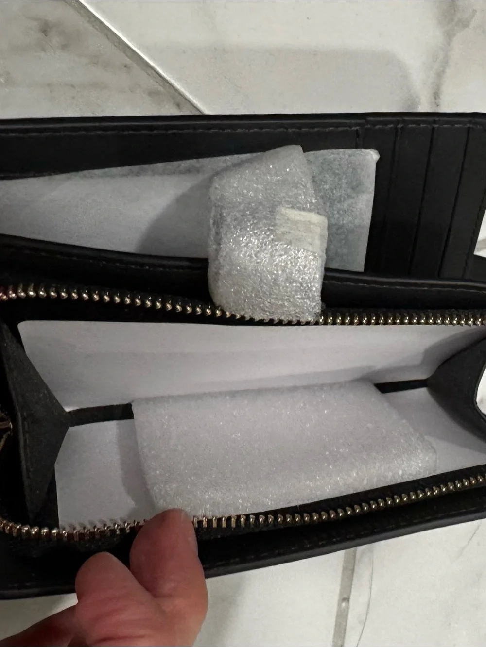 kate spade Black Pebbled Leather Zip Wallet with Gold Logo